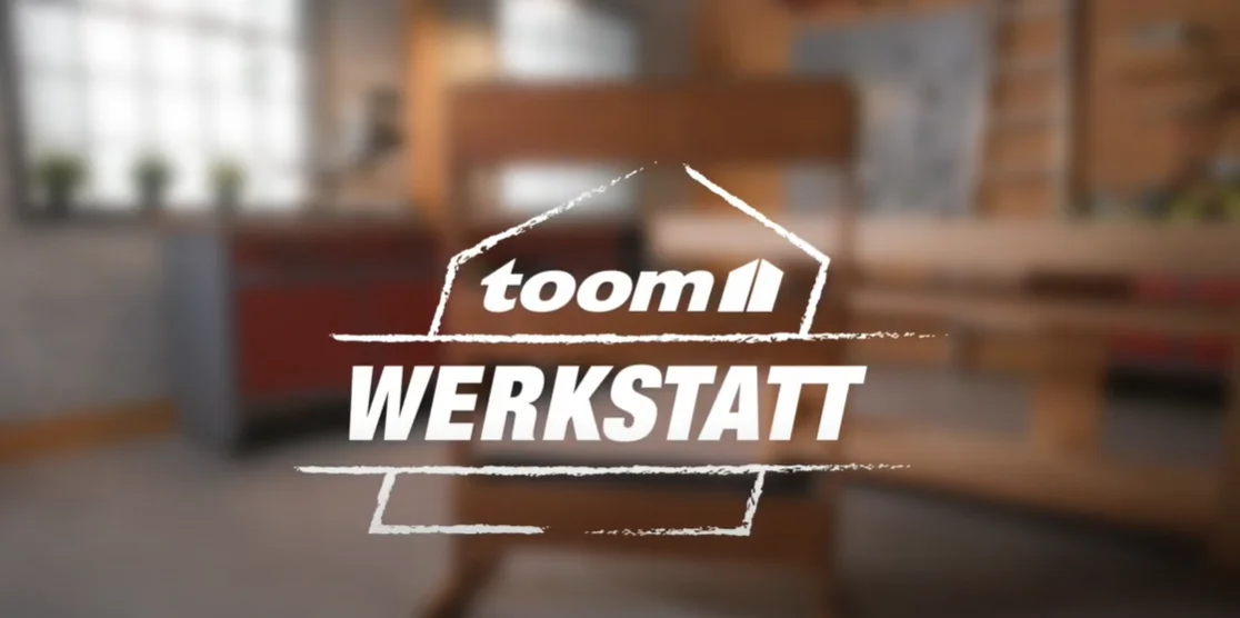 Unscharfer Hintergrund, Logo "toom Werkstatt"